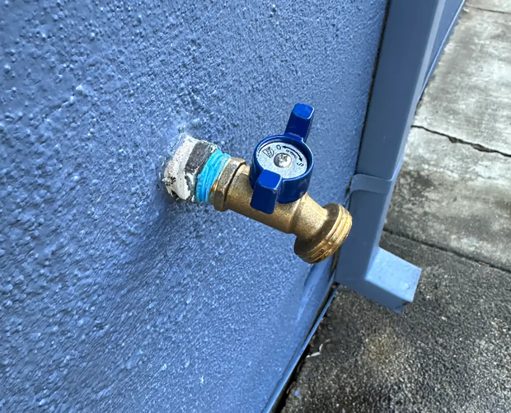 New quarter-turn outdoor hose bib with durable ball valve design installed on exterior wall, providing reliable shutoff, leak prevention, and low-maintenance operation.