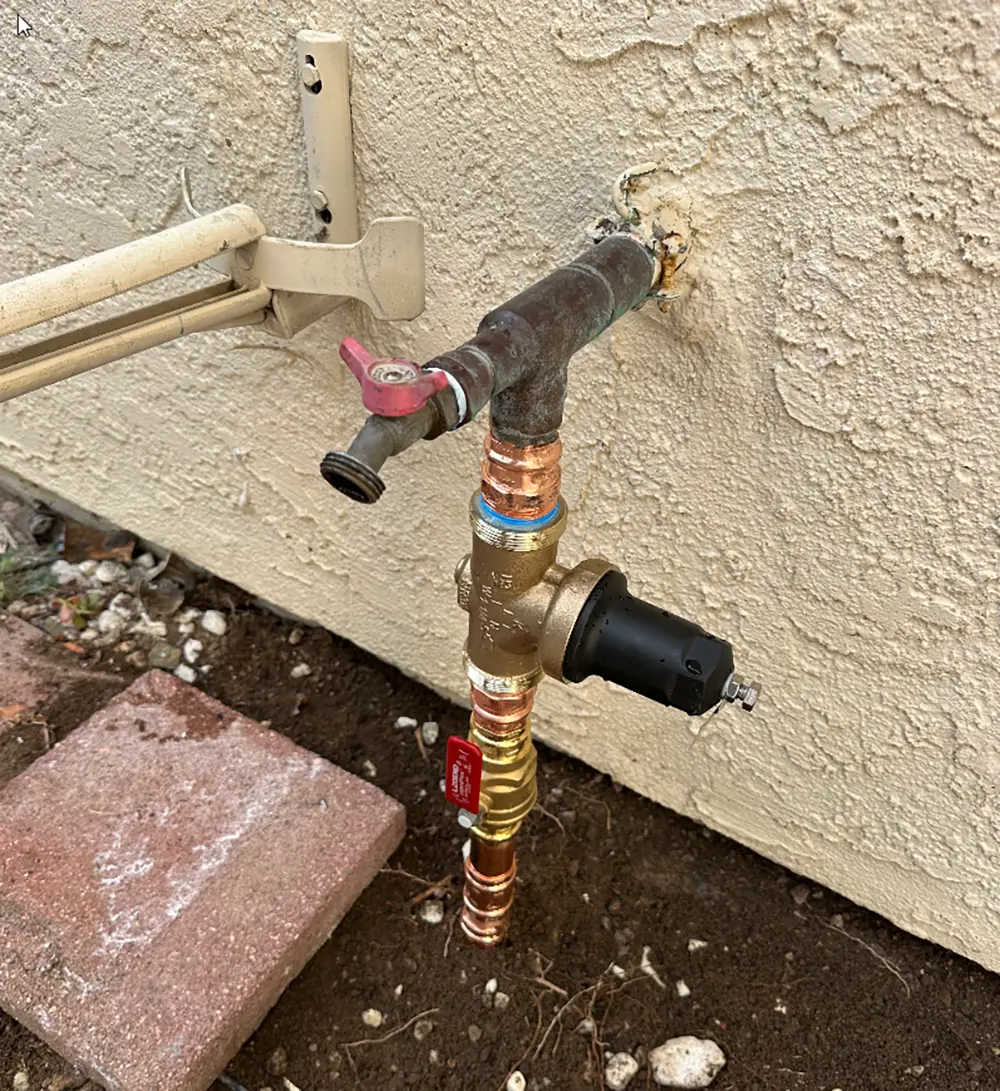 New pressure reducing valve (PRV) and main water shut-off valve installed with ProPress copper fittings, providing leak-free connections and properly regulated residential water pressure.